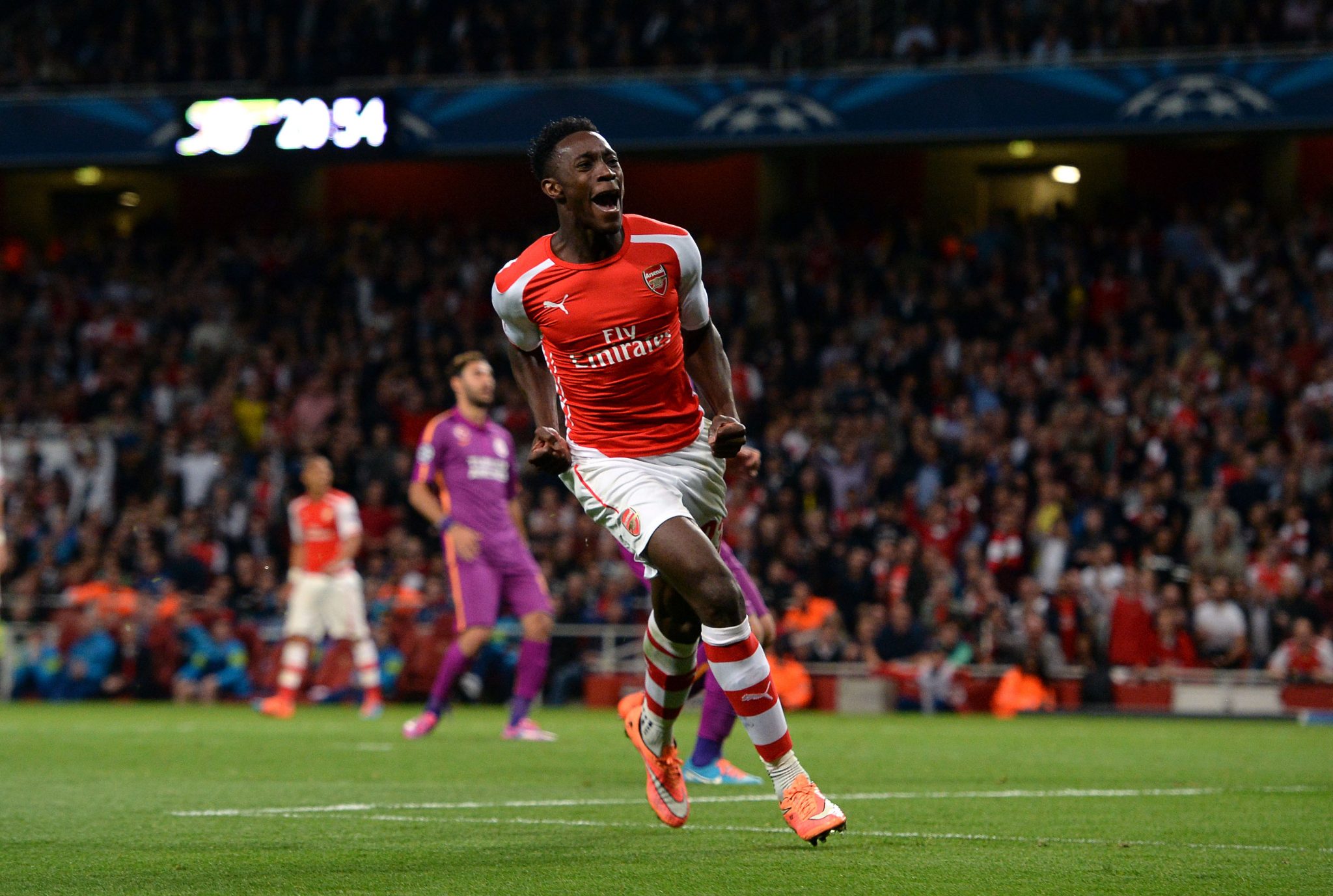 Arsenal's Danny Welbeck celebrates scoring his side's fourth goal to complete his hat-trick during the UEFA Champions League match at The Emirates Stadium, London. PRESS ASSOCIATION Photo. Picture date: Wednesday October 1, 2014, See PA story SOCCER Arsenal. Photo credit should read: Andrew Matthews/PA Wire.