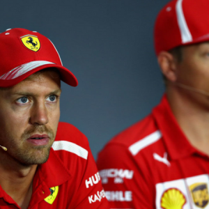 Vettel blames Hamilton for lap 1 crash