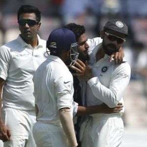fan enters the ground to meet Virat Kohli