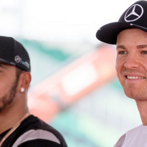 Vettel mimics the Rosberg-Hamilton hat incident