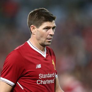 Steven Gerrard wearing a United shirt