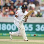 Dimuth Karunaratne stretchered off