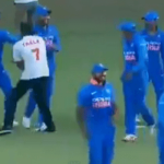 MS Dhoni chased around by an invader