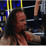 The Undertaker: The Phenom acknowledges fan reaction after his match with Goldberg.