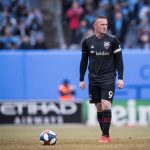 Wayne Rooney scores a penalty in 92nd minute and fans fly beer everywhere