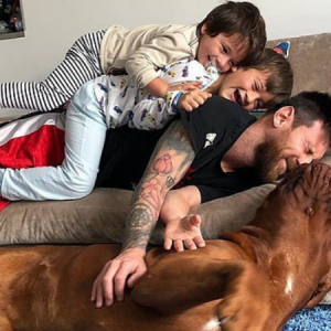 Lionel Messi: Watch Barcelona Superstar play piggy in the middle with his dog Hulk and children Thiago and Mateo