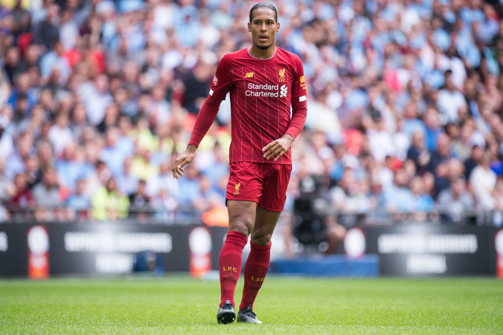 Virgil Van Dijk spots himself on the big screen, immediately starts egging his teammates on