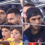 Lionel Messi and Luis Suarez react after Messi's son celebrates Real Betis goal
