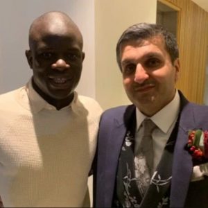 Liverpool fan tries to convince N'Golo Kante to join the Reds at a wedding and his reaction is adorable