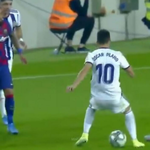 Watch Oscar Plano’s look of despair after being nutmegged by Lionel Messi