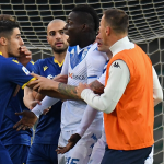 Mario Balotelli kicks ball into the crowd and storms off the pitch after suffering racist abuse