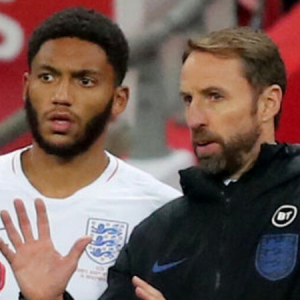 Raheem Sterling claps for Joe Gomez as fans bizarrely boo him while he came on against Montenegro