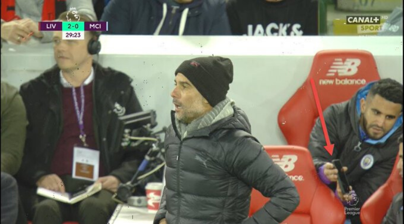 Riyad Mahrez appeared to crib about Salah’s goal while using a phone on the bench