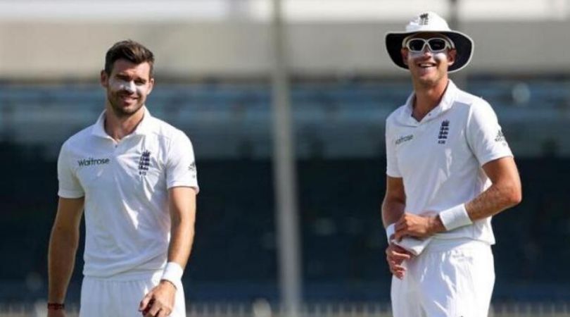 Stuart Broad and James Anderson react to model wearing cricket pads on ramp