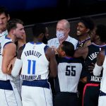 Pat Beverley and Lou Williams encourage Marcus Morris for his foul on Luka Doncic