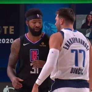 Marcus Morris slaps Luka Doncic on the head