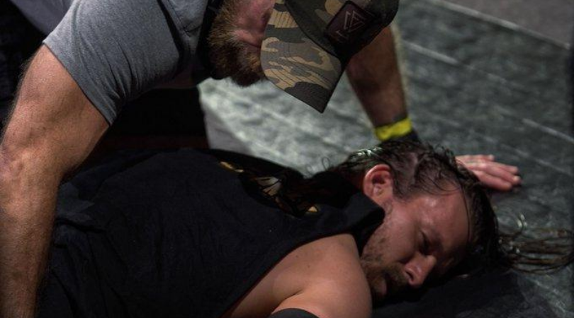 Pat McAfee assaults Adam Cole and gets kicked out of the Arena