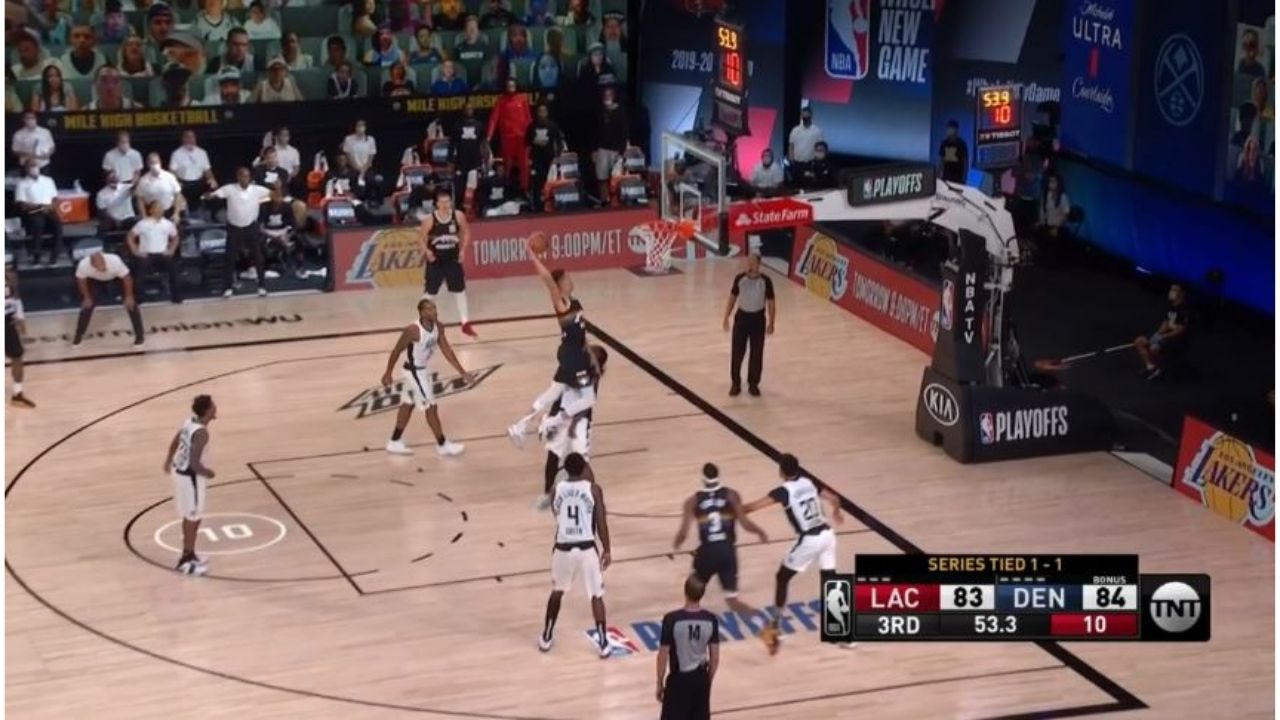 Michael Porter Jr posterizes Montrezl Harrell