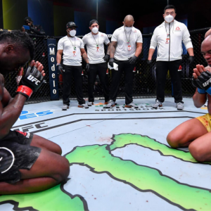 Uriah Hall cries in front of Anderson Silva after his TKO win at UFC Vegas 12