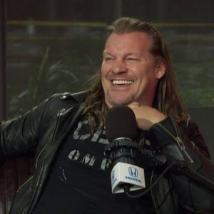 Chris Jericho reacts to a dangerous spot against DX in a TLC match