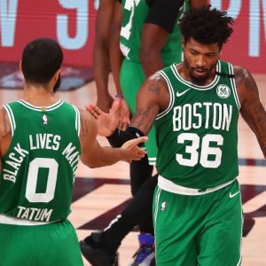 'Celtics locker room in turmoil': Marcus Smart gets his aged whiskey stolen and replaced by karaoke set during team's Secret Santa