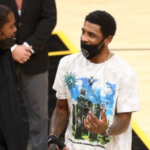 "Kyrie Irving walks into the arena looking like Moses": Hilarious footage of Nets star entering the Suns' court ahead of last night's game is going viral