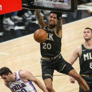 “John Collins put Joel Embiid in a choke hold and dunked on him!”: NBA fans react to the Hawks big man’s emphatic lob dunk from Trae Young over the Sixers MVP in Game 6