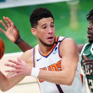 “Devin Booker literally wrapped his arms around Jrue Holiday”: NBA fans react to the Suns superstar getting away with his 6th foul as the refs swallow their whistle in Bucks Game 4 win