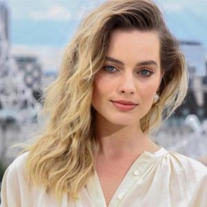 Margot Robbie immediately told WWE Superstar that she used to sleep next to his life-size cardboard cut-out