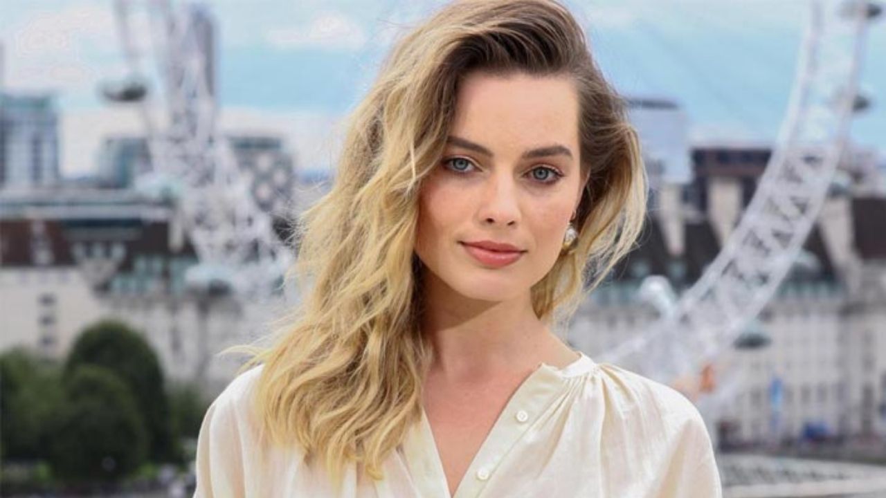 Margot Robbie immediately told WWE Superstar that she used to sleep next to his life-size cardboard cut-out