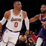 "Russell Westbrook out here slapping grown men!": Lakers fans react as 2017 MVP hilariously tries to slap somebody's hands away while giving a young fan his shoes