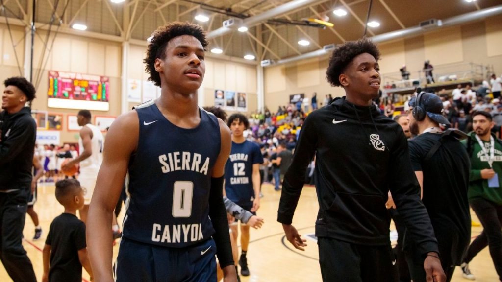 "NeverMissAllie schools Bronny James in free throw competition": LeBron James' eldest son loses his shoes in free throw challenge with up-and-coming girl hooper