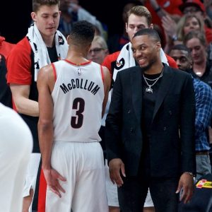 "Dame made this little fan's Christmas!": Damian Lillard makes an adorable gesture to a courtside fan holding up the Blazers star's banner