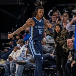 "Grizzlies are just playing with these fools, man!": Ja Morant caps off team-highlight with an incredible two-handed windmill dunk in win vs Wizards