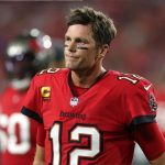 $250 million worth Tom Brady responds to ‘The Masked Singer‘ appearance theory with ‘busy with my sh*t’ comment