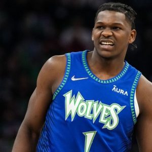 “Hope Anthony Edwards is able to make a quick recovery!”: NBA Twitter reacts as the Wolves star gets carried to the locker room after colliding knees with Day’Ron Sharpe