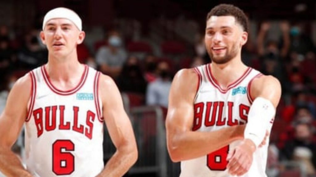 “That headband is sweaty as sh*t!”: Alex Caruso gets a warm welcome back from fellow Bulls teammates Zach LaVine and Tristan Thompson in win over Cavaliers