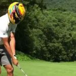 "That's crazy"– Steph Curry plays golf shot while wearing Lewis Hamilton helmet