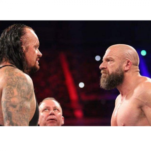 The Undertaker(L) and Triple H(R)