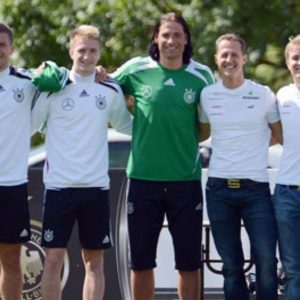 "I am a big football fan and it is fantastic to be with the team" - Throwback to when Nico Rosberg and Michael Schumacher met the German National Football team in 2012