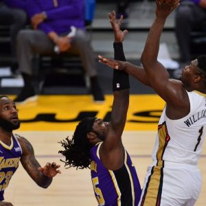 "Zion Williamson stole LeBron James's ENTIRE draft day look and spent $10,000 on it!": When the Pelicans rising star borrowed the Lakers superstar's 2003 look 