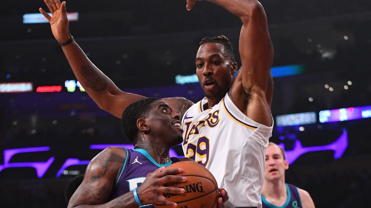 Dwight Howard is a ferocious rebounder and rim protector. So what happens when he gets into foul trouble? He kisses the referee, of course!