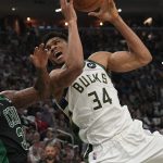 "Reminds me of Karl Malone and Dennis Rodman falling up the court!": Hilarious clip of Giannis Antetokounmpo tussling with Marcus Smart sends NBA Twitter into rapture