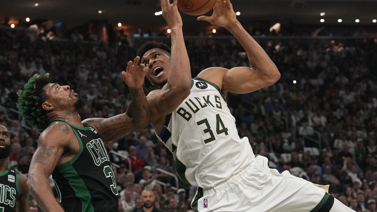 "Reminds me of Karl Malone and Dennis Rodman falling up the court!": Hilarious clip of Giannis Antetokounmpo tussling with Marcus Smart sends NBA Twitter into rapture