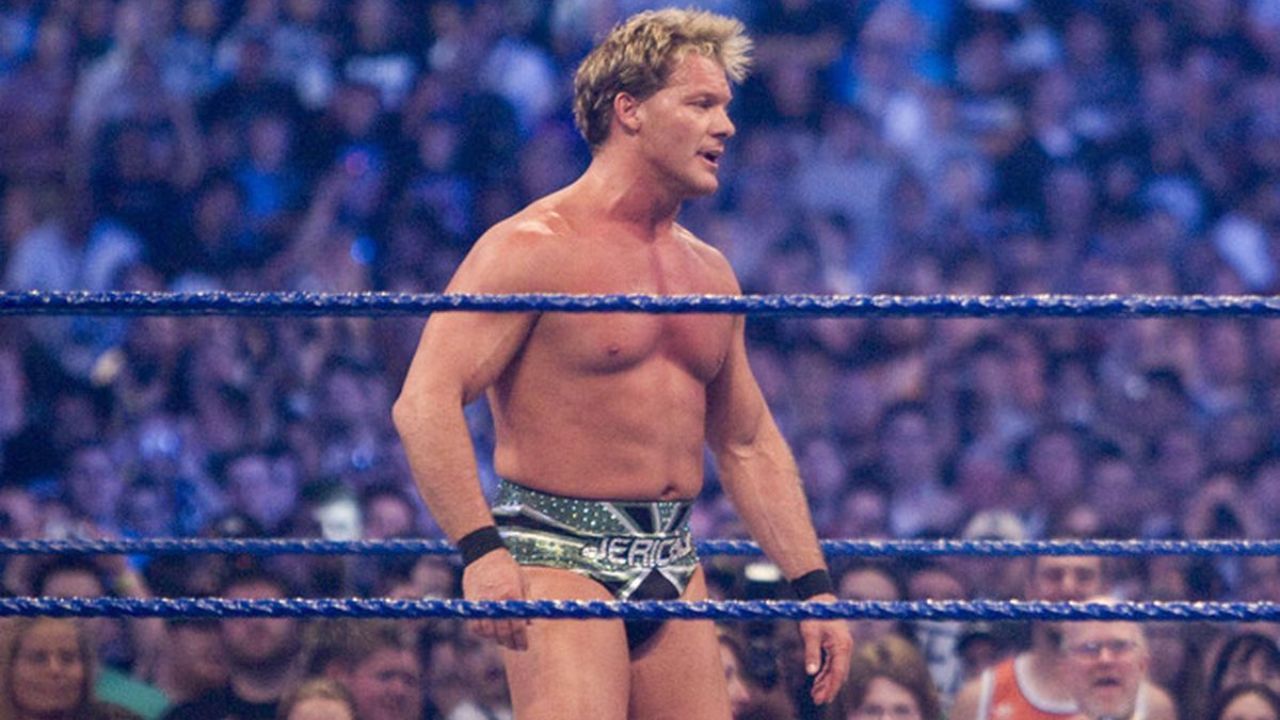 Chris Jericho reacts to Neville's injury during their match