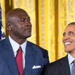 Michael Jordan looks down on Barack Obama as he receives the Presidential Medal of Freedom