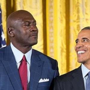 Michael Jordan looks down on Barack Obama as he receives the Presidential Medal of Freedom