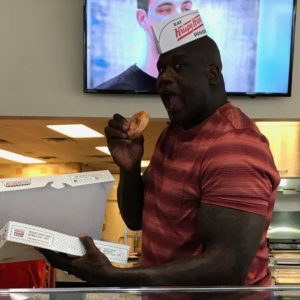 7ft, 325 pound Shaquille O’Neal really gobbled down a doughnut without even biting into it