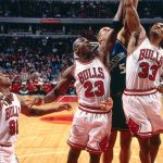 6'6" Michael Jordan and 6'7" Scottie Pippen had to wrestle down Dennis Rodman to protect him from 7-foot Shaquille O'Neal