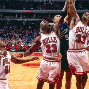 6'6" Michael Jordan and 6'7" Scottie Pippen had to wrestle down Dennis Rodman to protect him from 7-foot Shaquille O'Neal